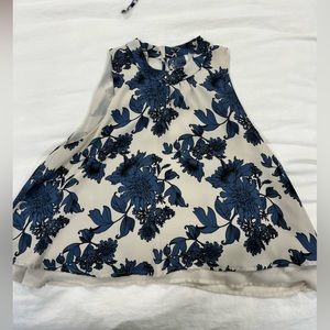 Like new ASTR the label floral layered top size small